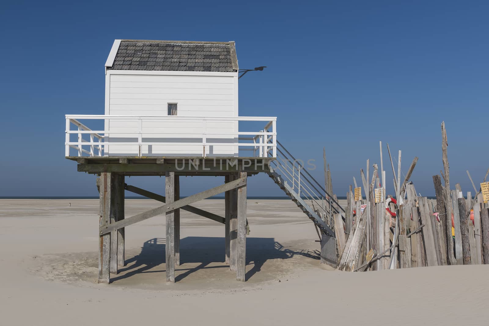 Famous sea cottage on the sandbar the Vliehors on the wadden Island Vlieland in the Netherlands
