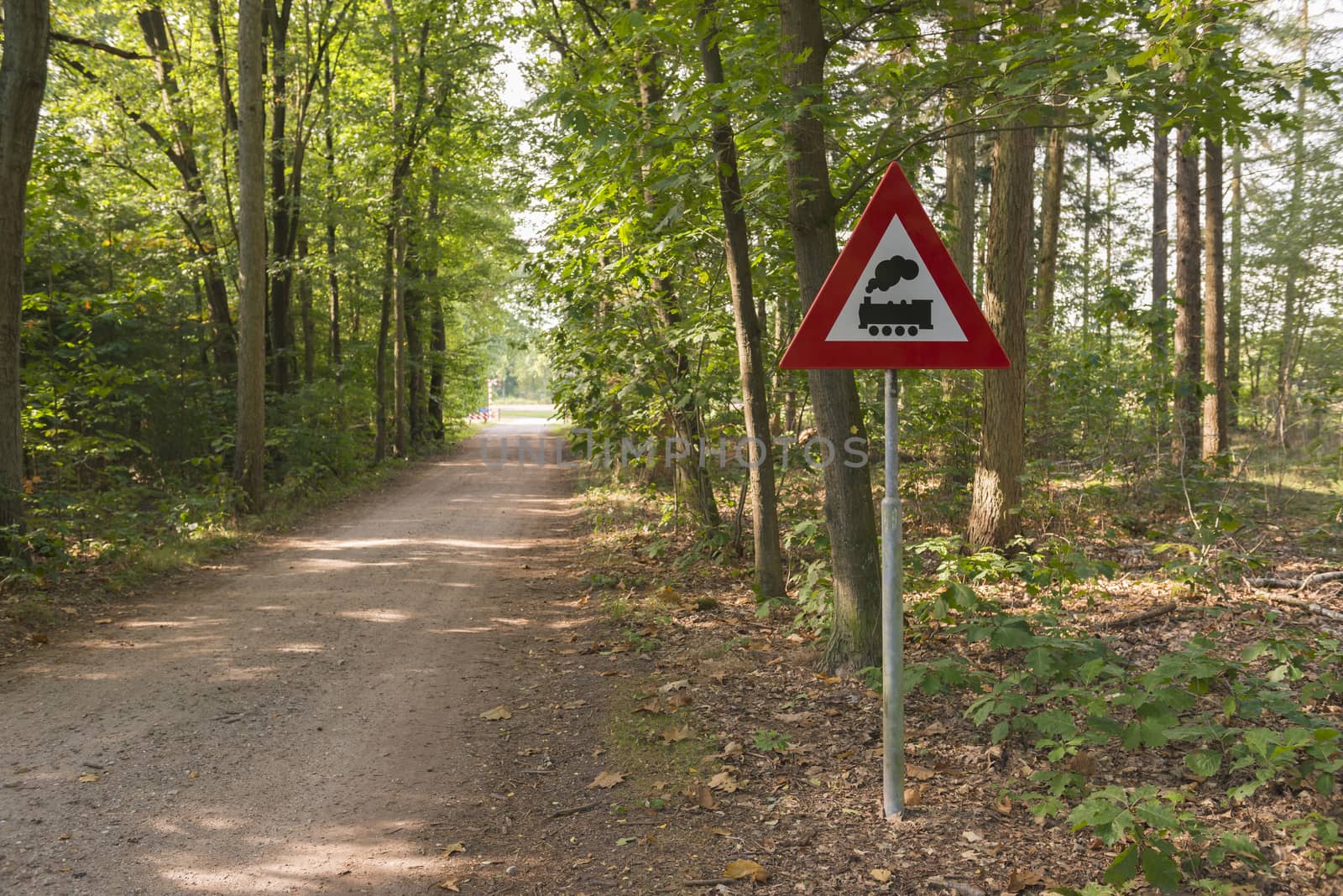 Warning sign with meaning level crossing without barriers in the by Tofotografie