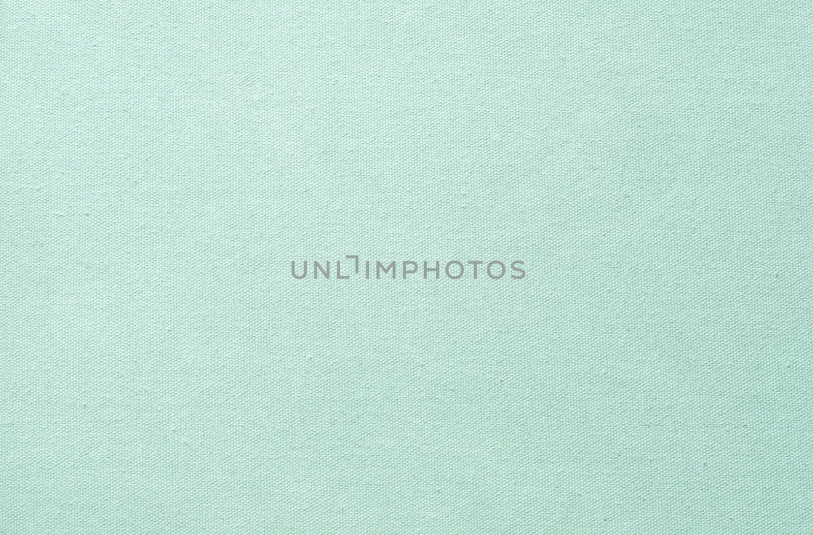 green pastel fabric background by phochi