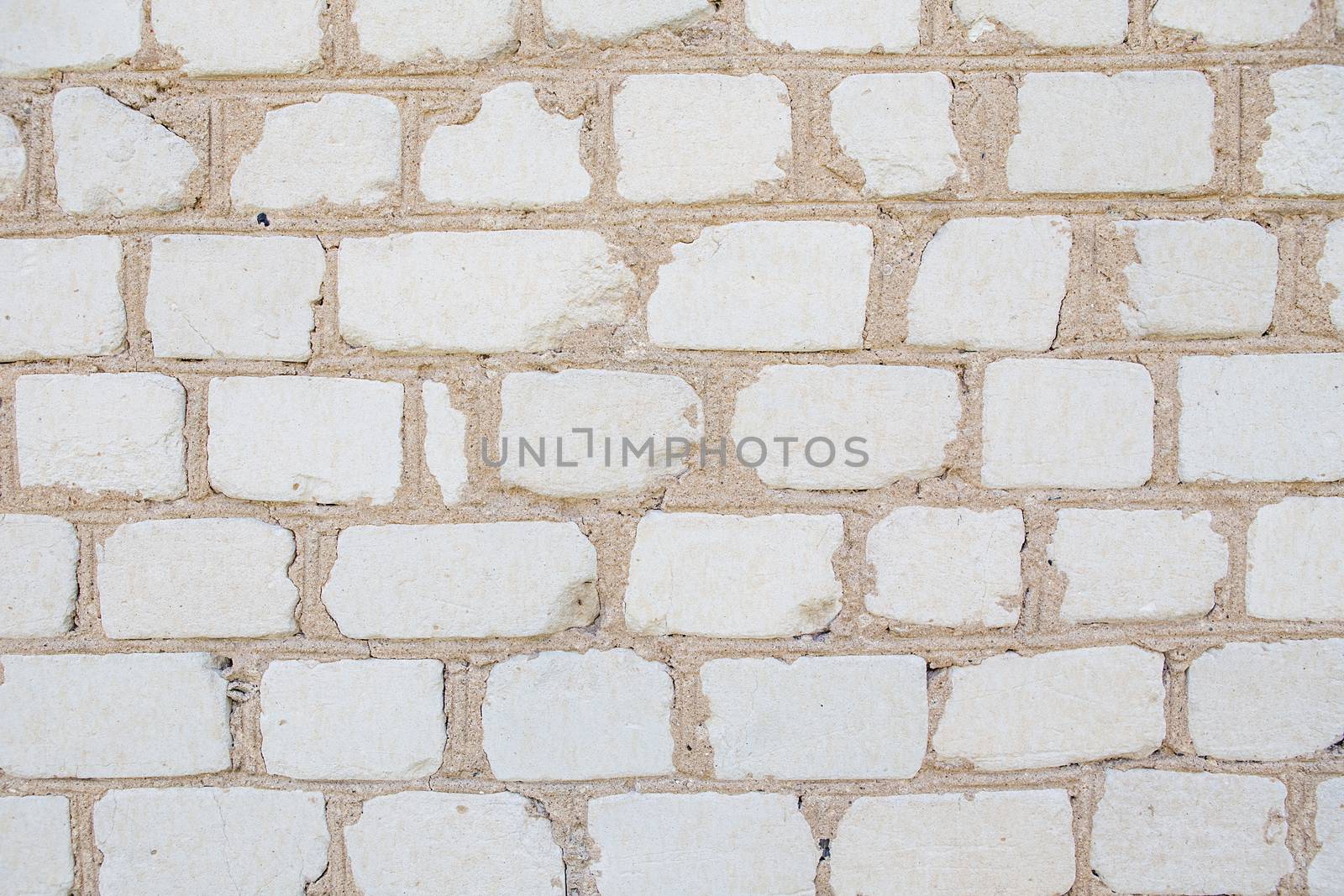 White grunge brick wall background by natazhekova