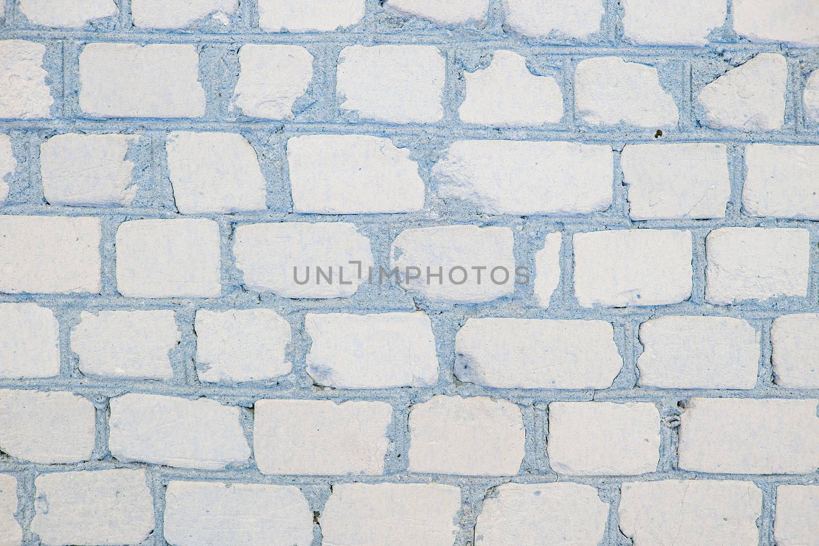 White grunge brick wall background by natazhekova