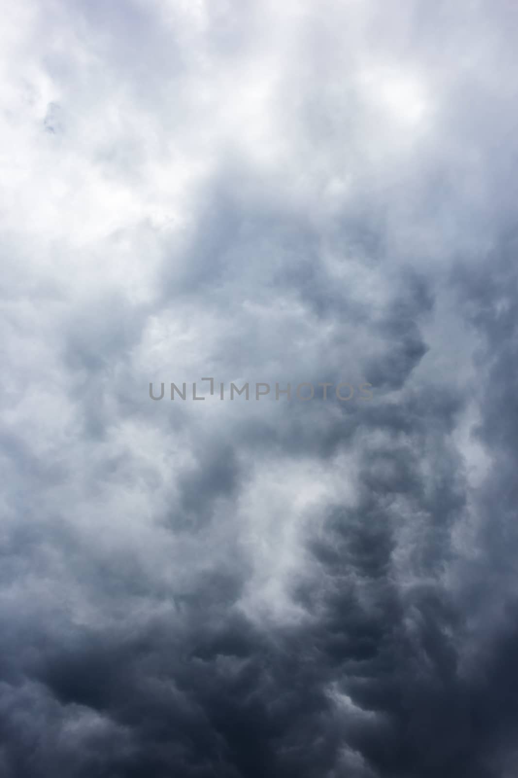 Abstract background, dark sky with clouds close-up