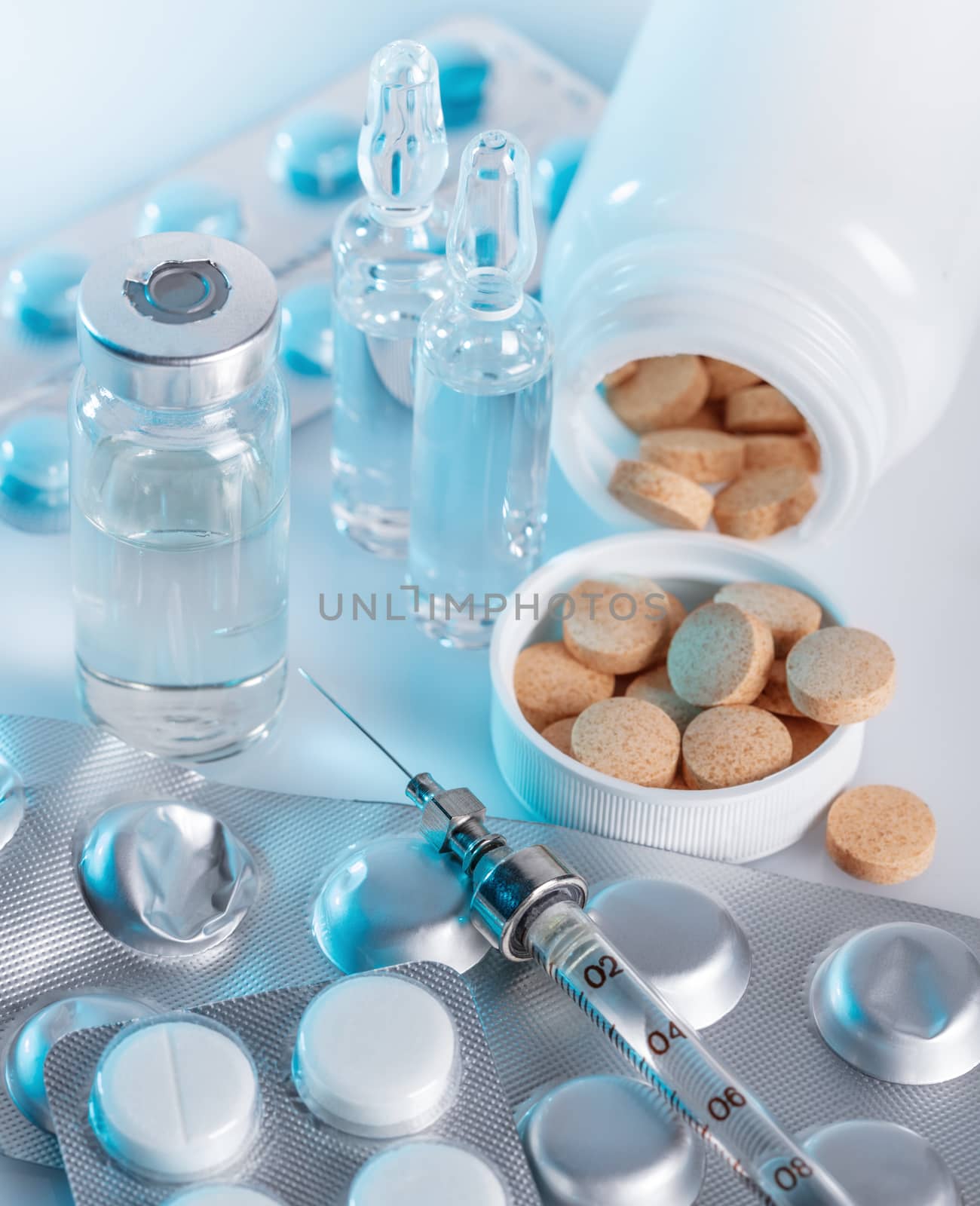 medical drugs and syringe closeup by MegaArt