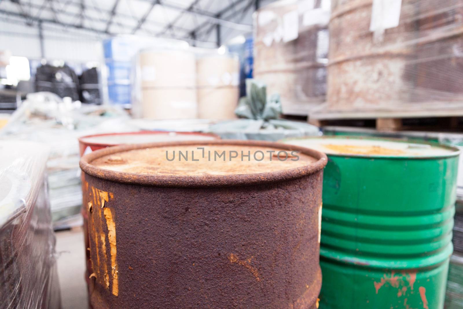 Rusty barrels with toxic chemical waste by wellphoto