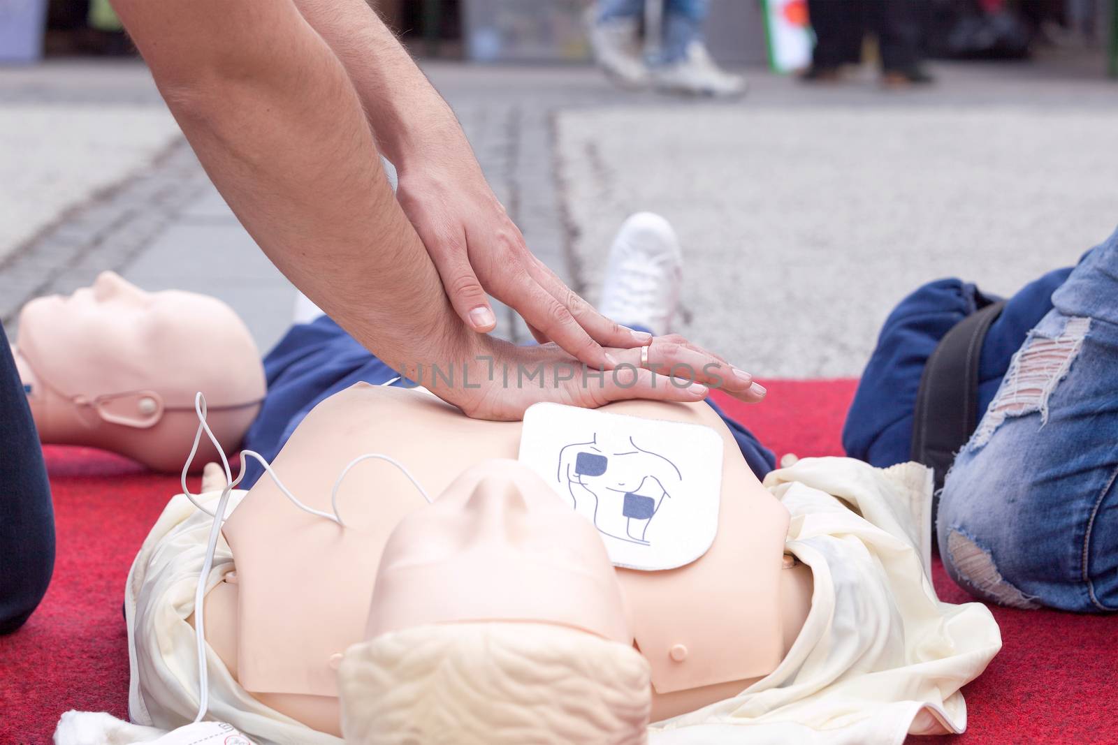 First aid training. CPR. Defibrillation. by wellphoto