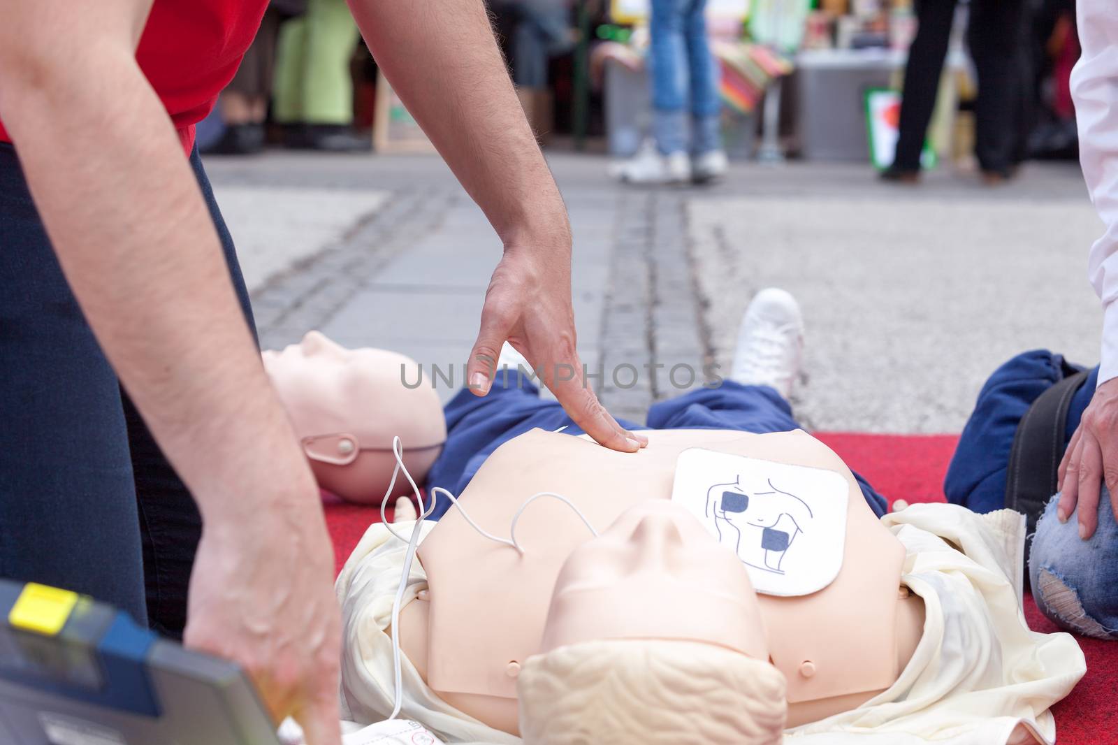 Defibrillation training. First aid. CPR. by wellphoto