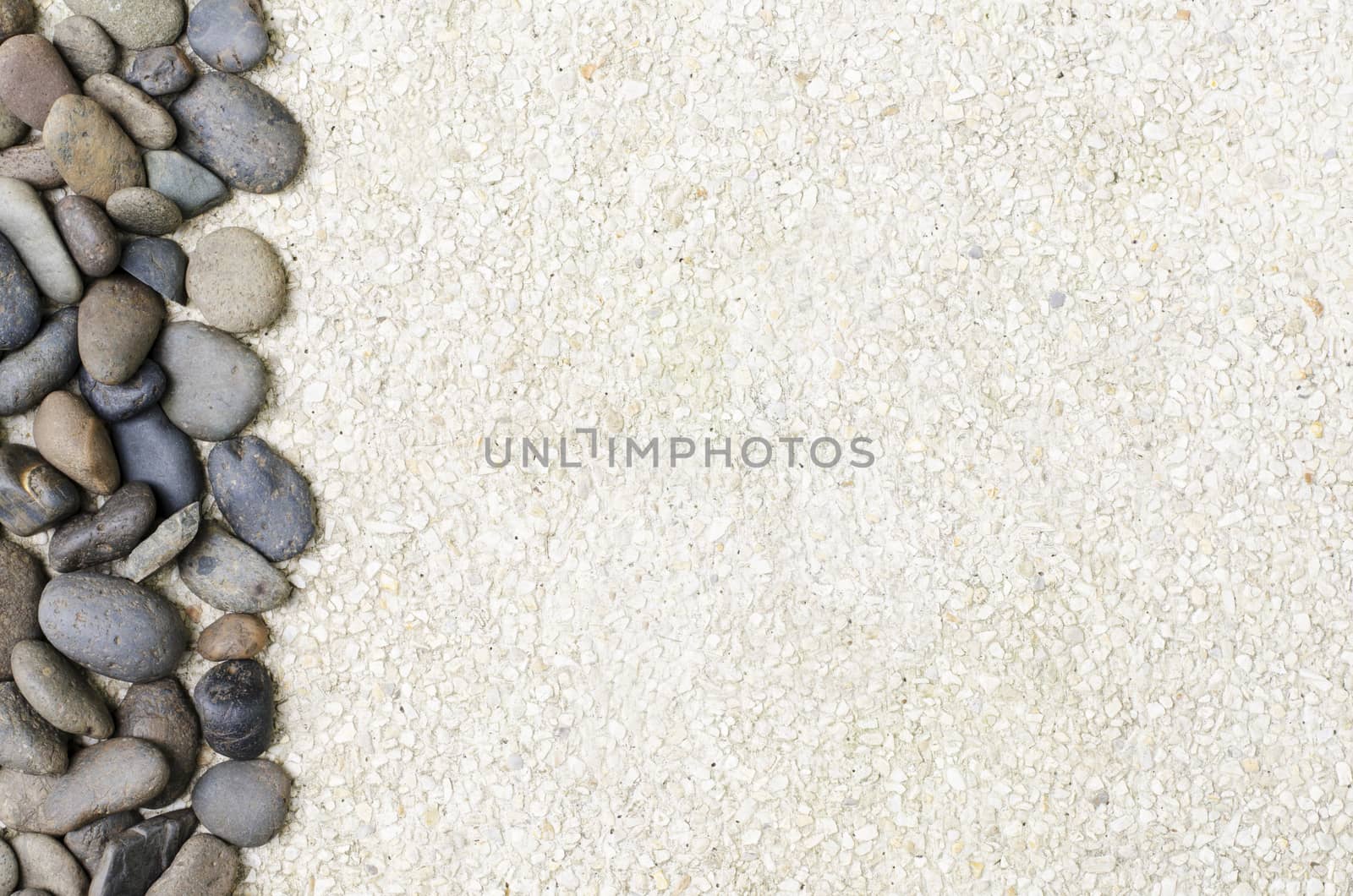 small stone on gravel background copy space