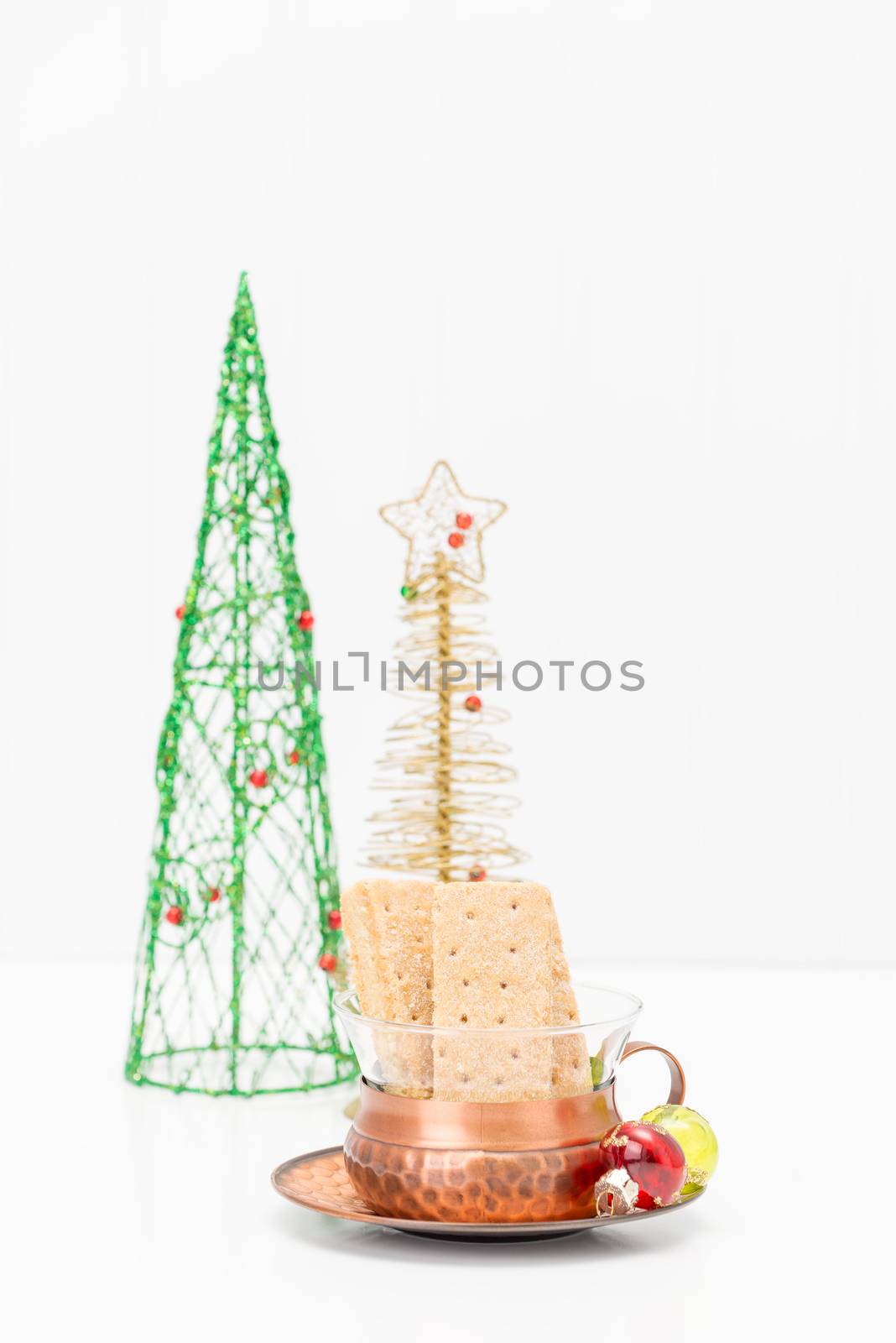 Delicious buttery shortbread cookies presented in a christmas theme.