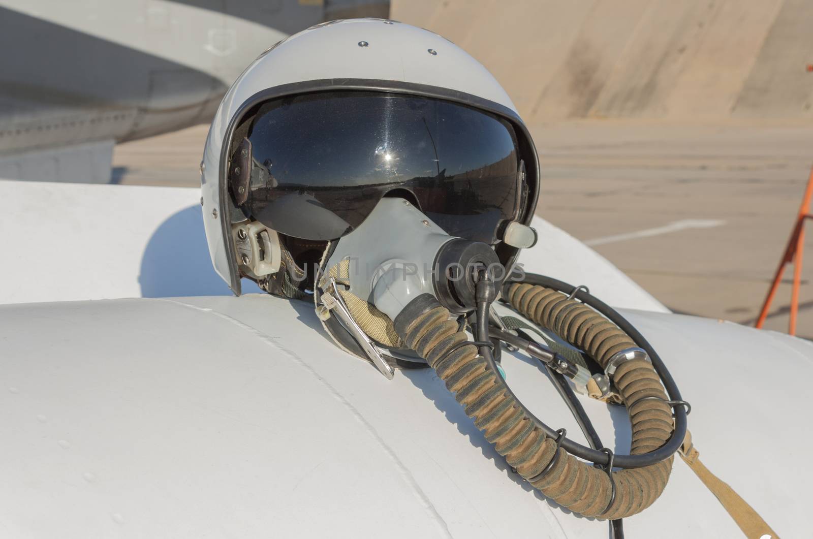 Helmet and oxygen mask of a military pilot by aarrows