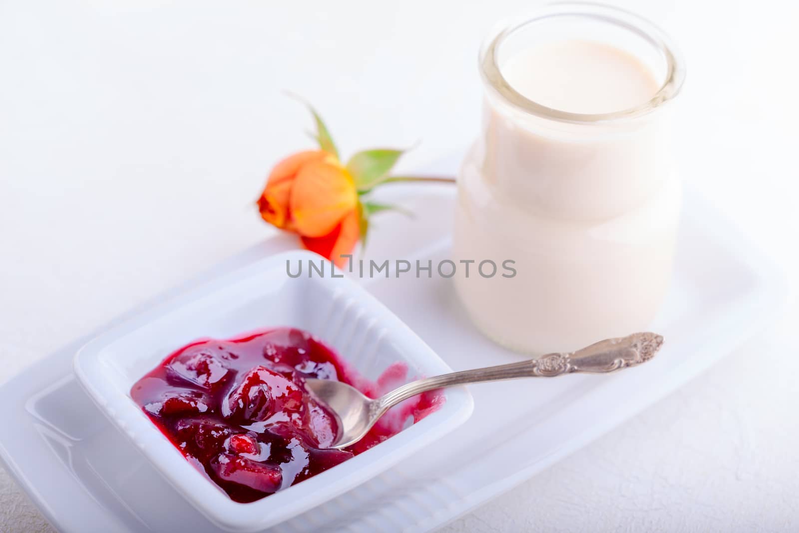 Home made yogurt and plum jam. Healthy breakfast.