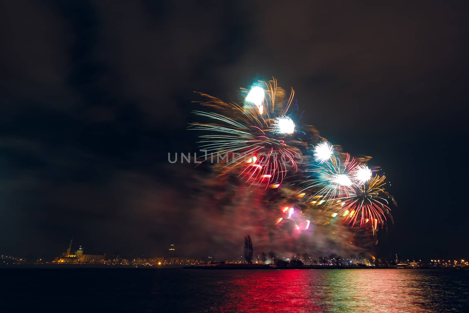 Colored New Year fireworks in centre of Riga