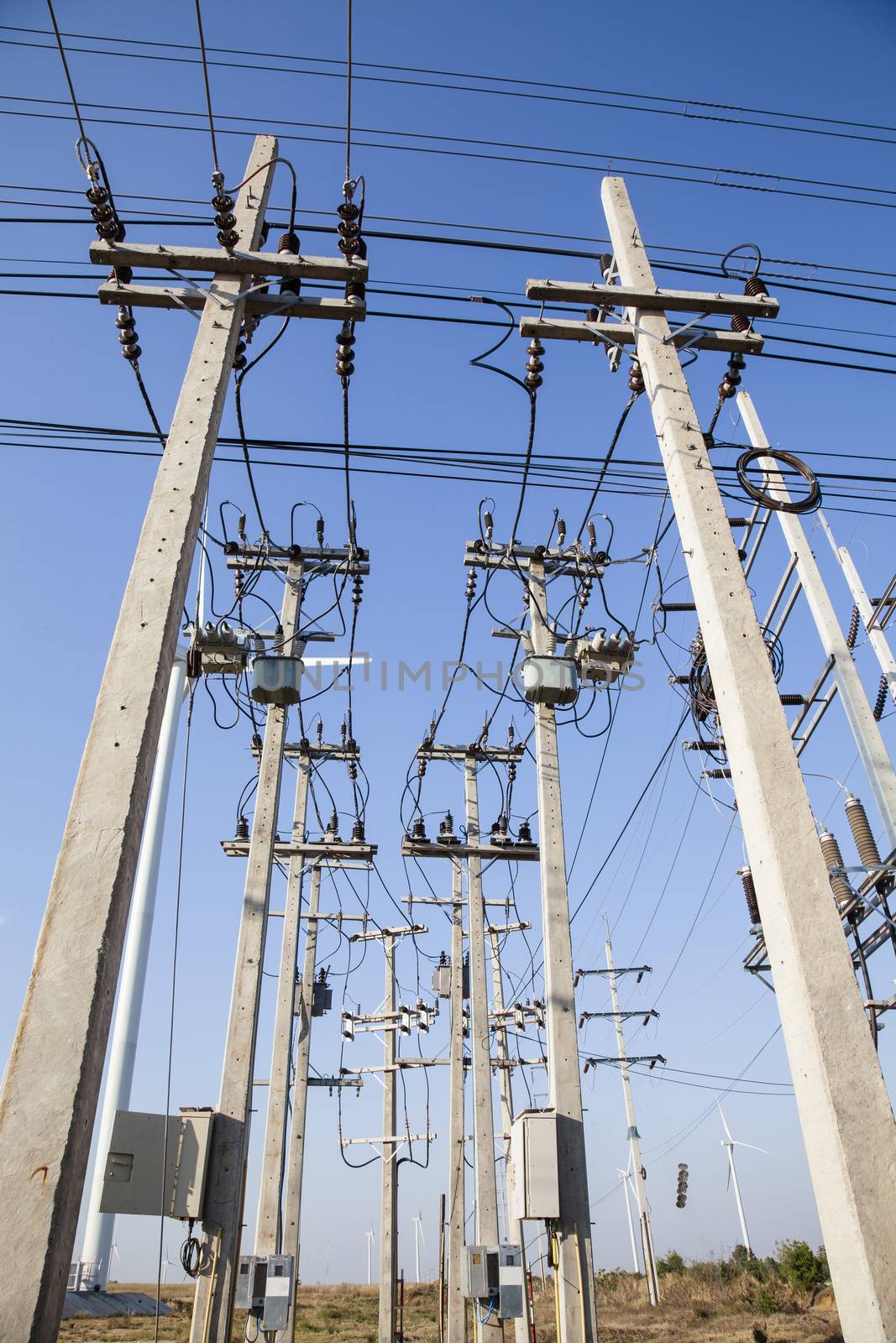 Electrical power poles in The electricity needed to power an ele by jee1999