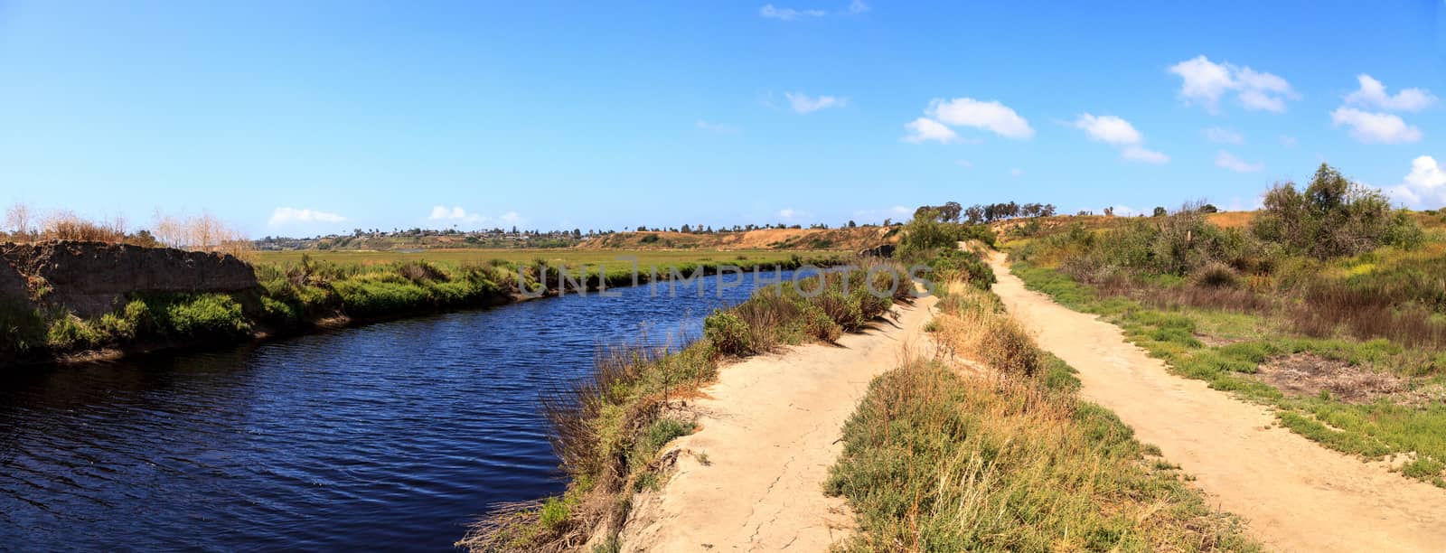 Upper Newport Bay Nature Preserve hiking trail winds along the marsh, where you will see wildlife in Newport Beach, California USA