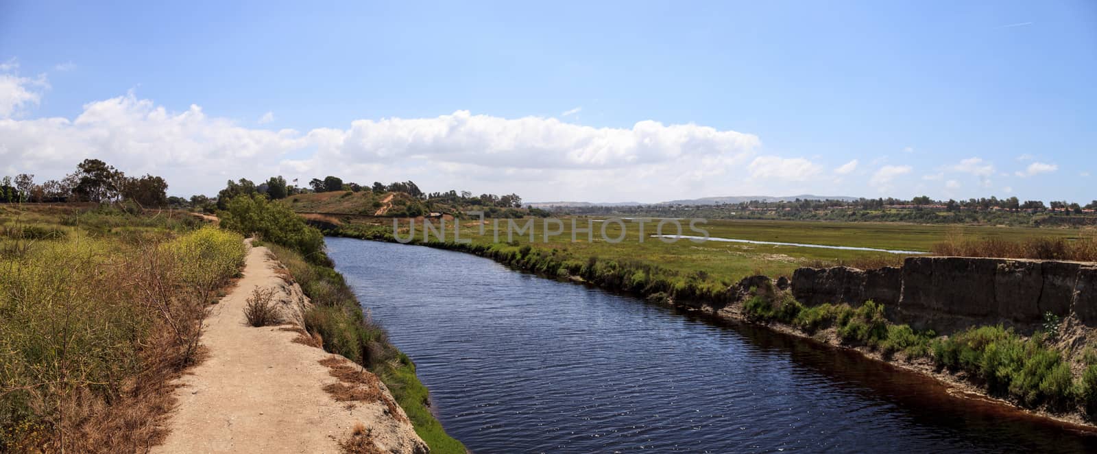 Upper Newport Bay Nature Preserve hiking trail winds along the marsh, where you will see wildlife in Newport Beach, California USA