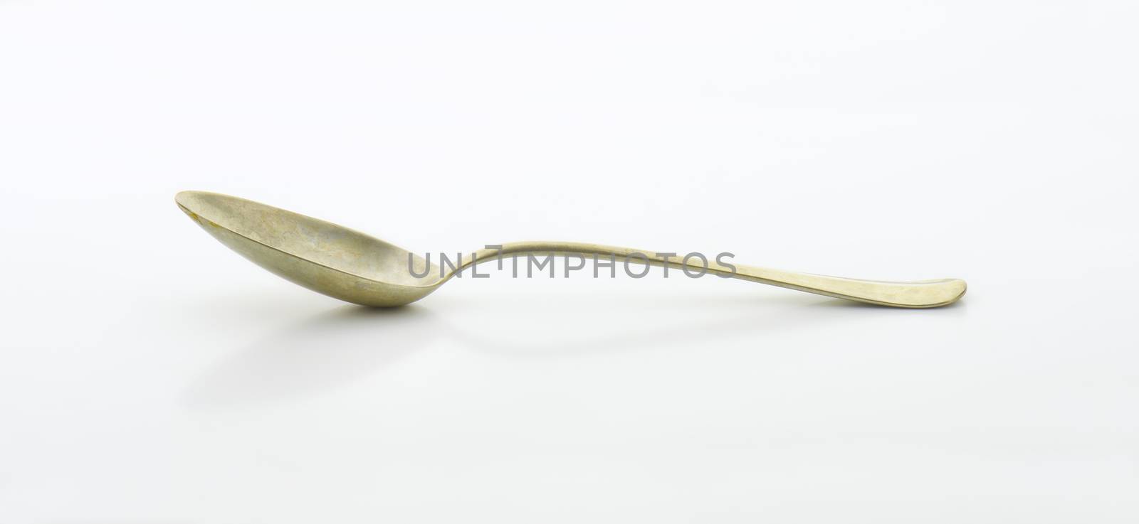 Old silver spoon by Digifoodstock
