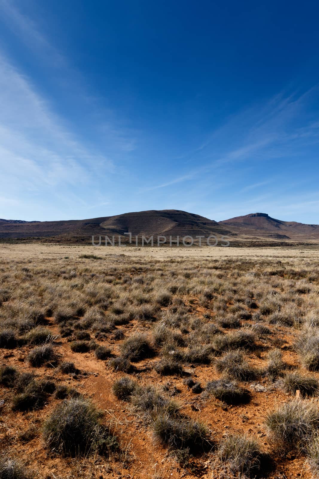 Blue Skies with crater in the side of the mountain.