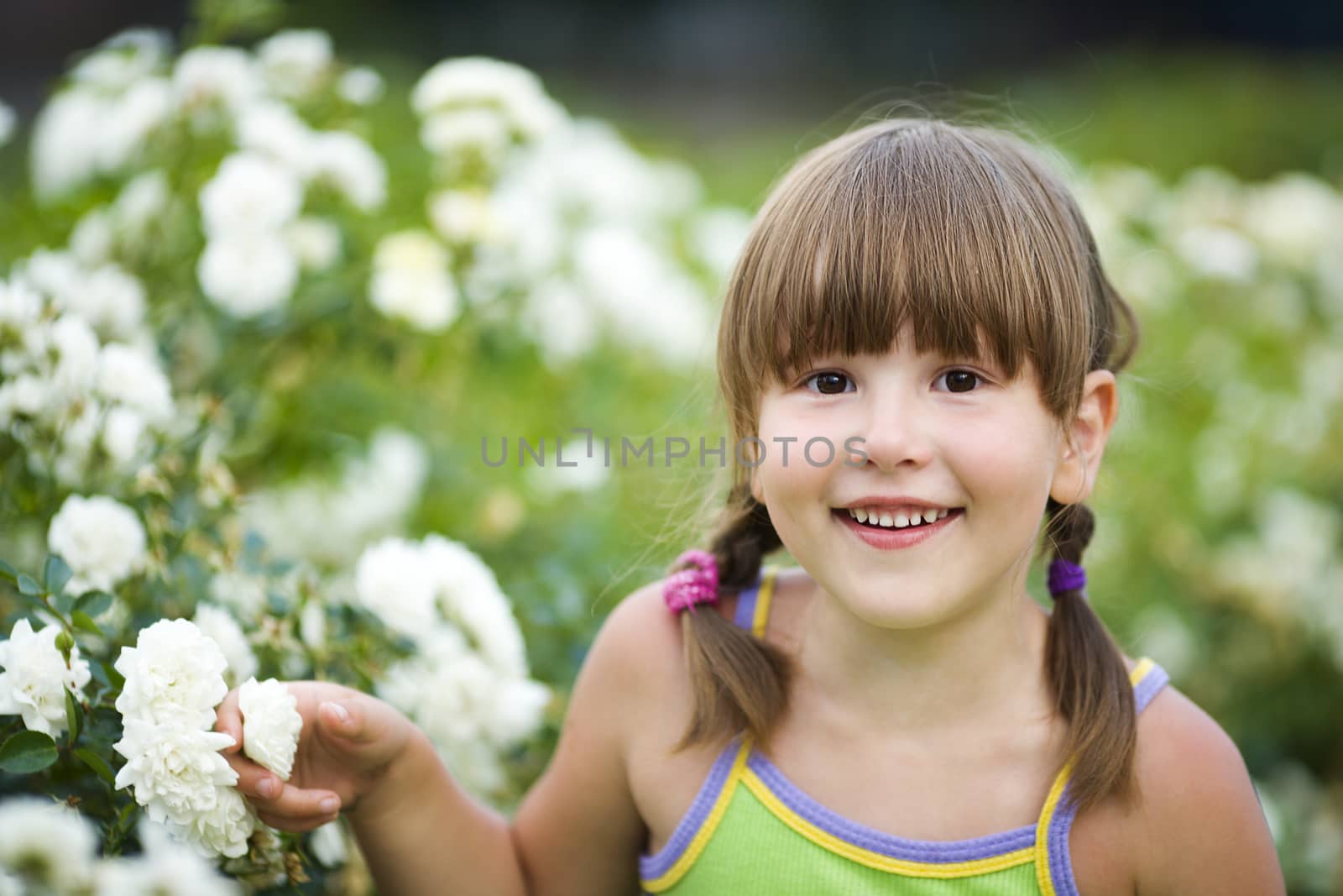 Girl smiling outdoors by olga_sweet