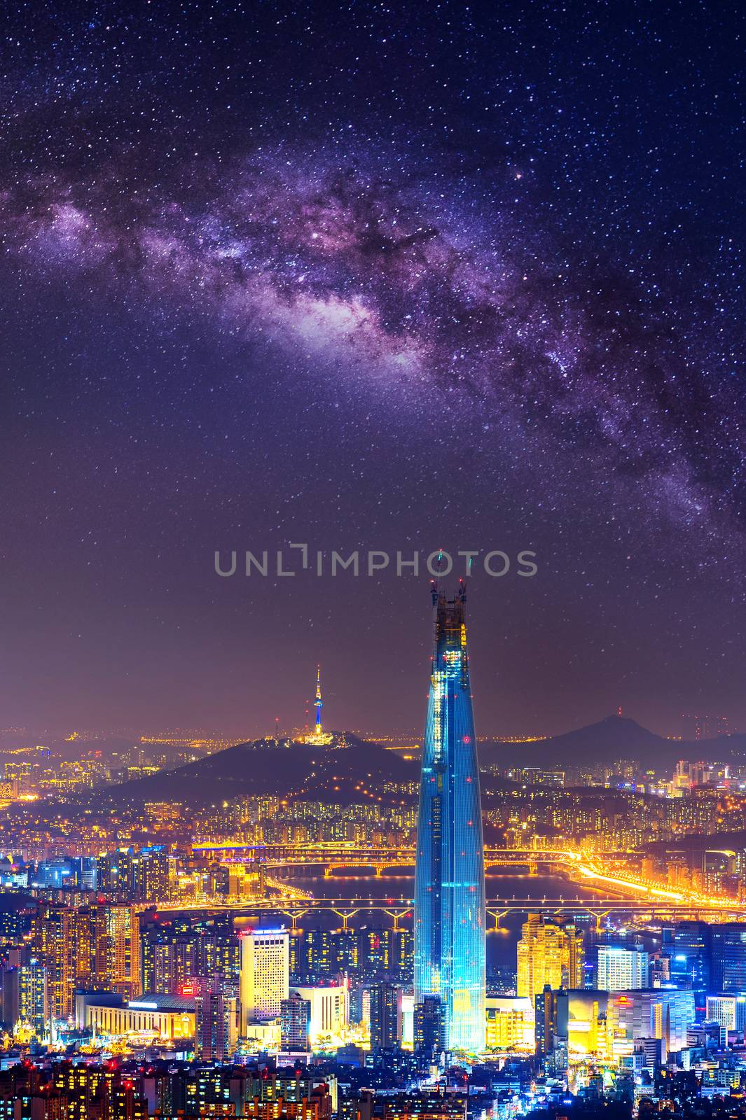 South Korea skyline of Seoul, The best view of South Korea with Lotte world mall and Milky way at Namhansanseong Fortress. by gutarphotoghaphy