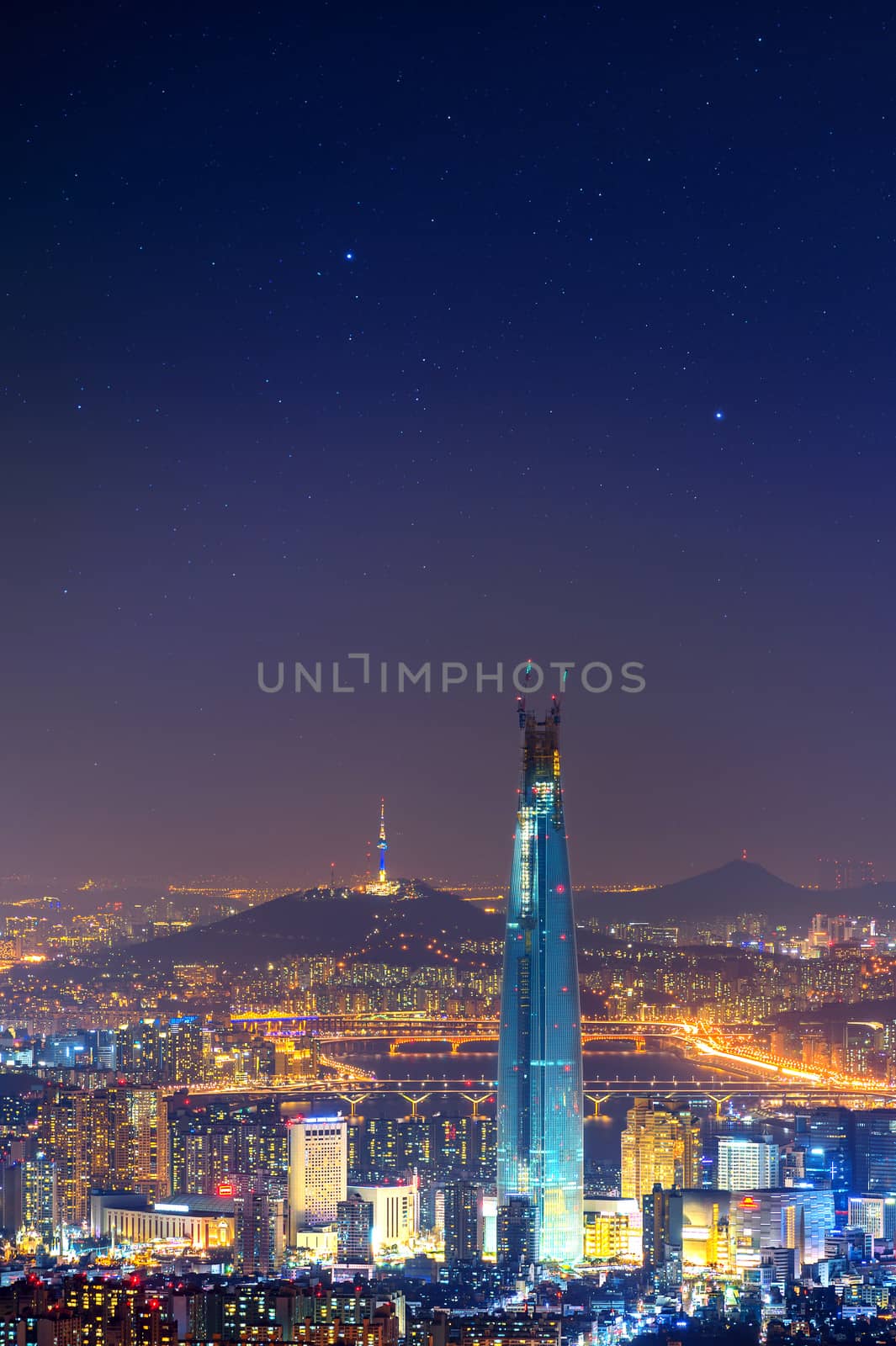 South Korea skyline of Seoul, The best view of South Korea with Lotte world mall at Namhansanseong Fortress. by gutarphotoghaphy