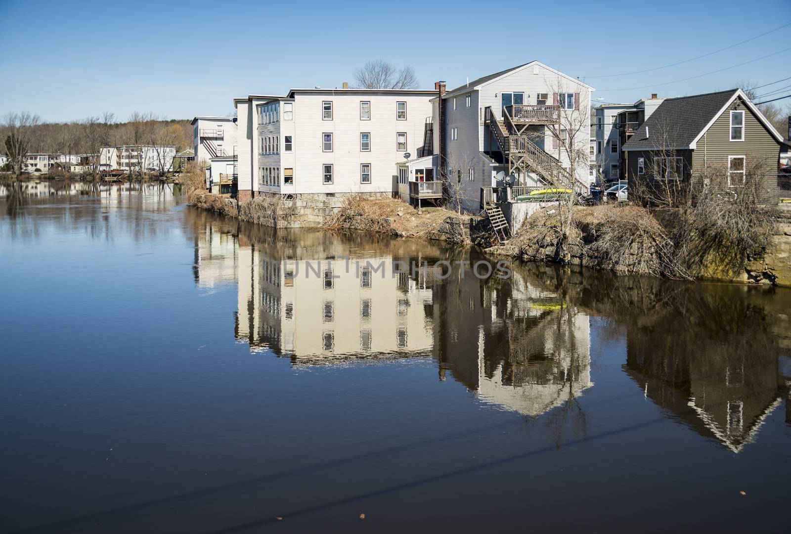 Houses on the Saco River. The river adjoining the two towns of Biddeford and Saco in Maine, USA