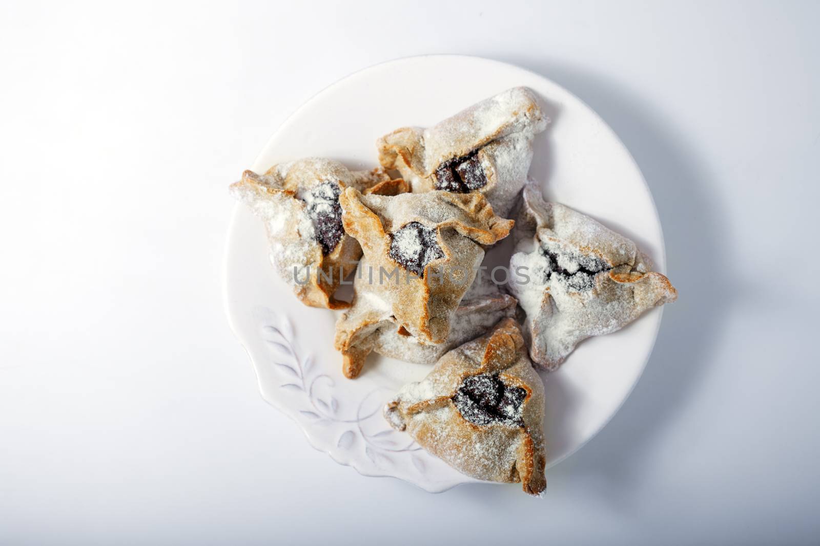 Jewish Pastry Hamantaschen on a table for Purim Holiday