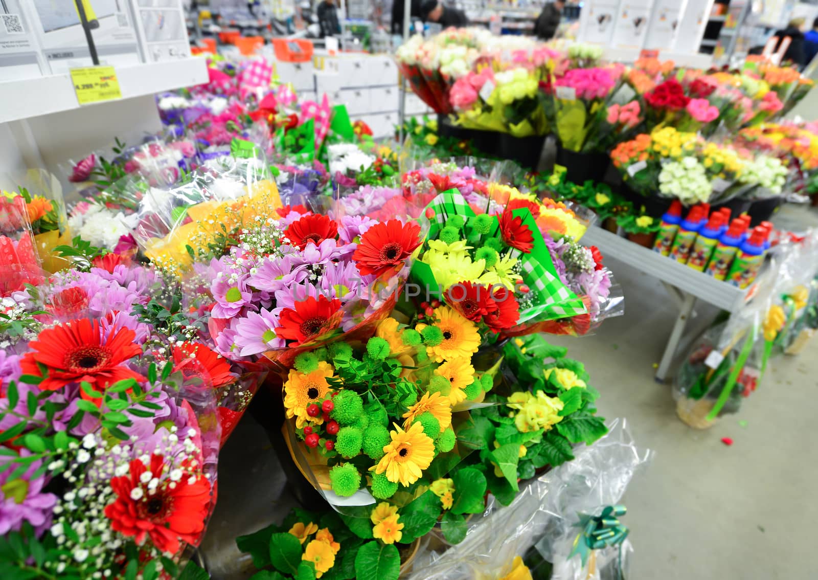 A flower bouquet with a lot of a different flowers