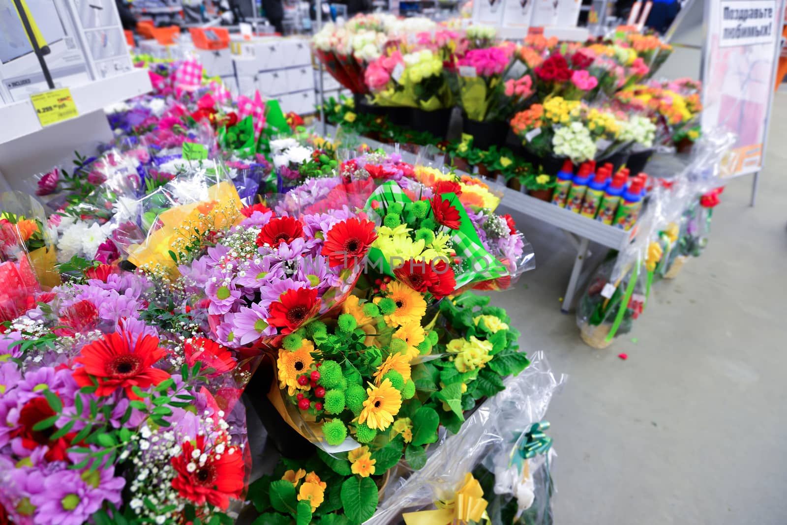 flower bouquet with a lot of different flowers by olgavolodina