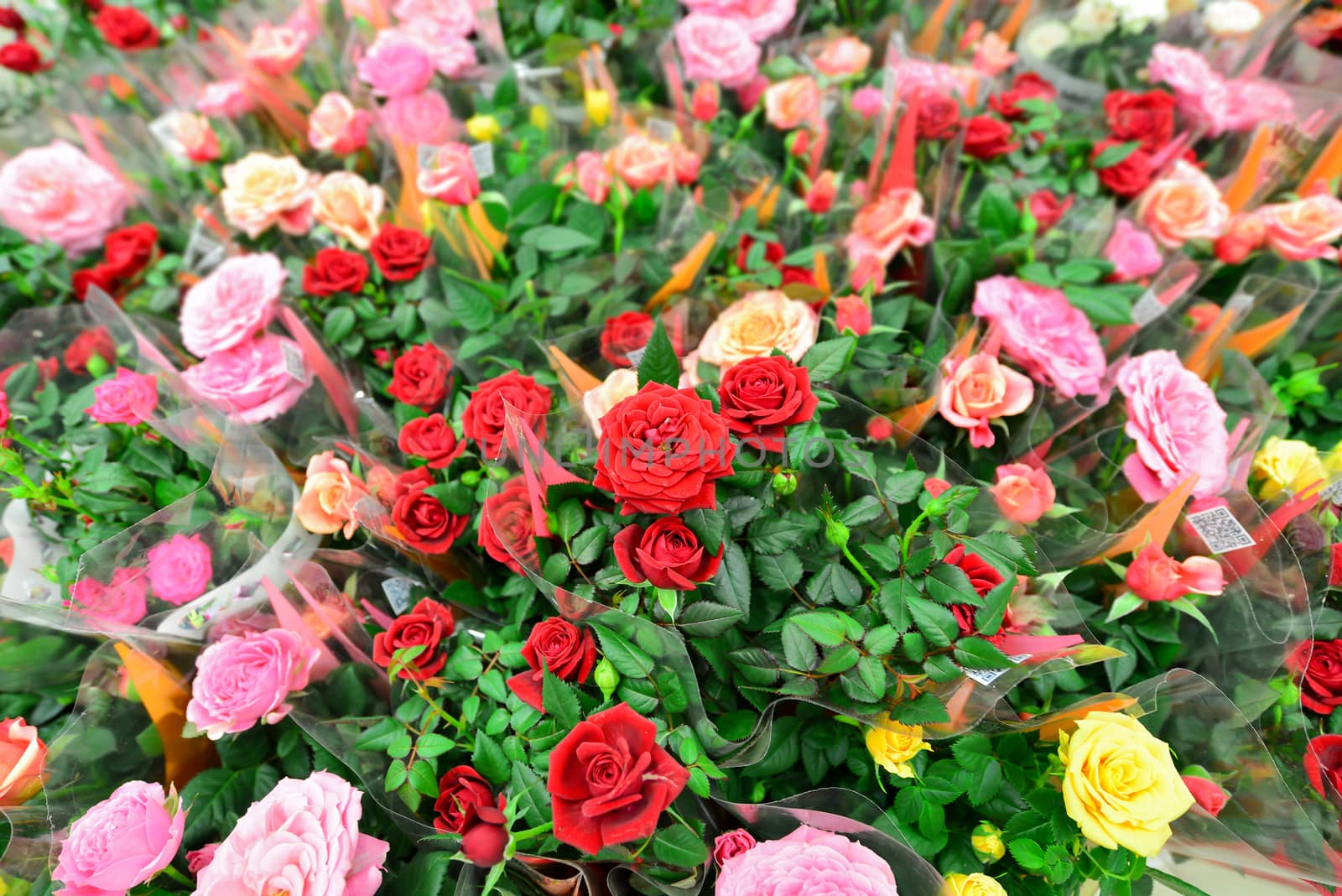 A flower bouquet with a lot of a different flowers