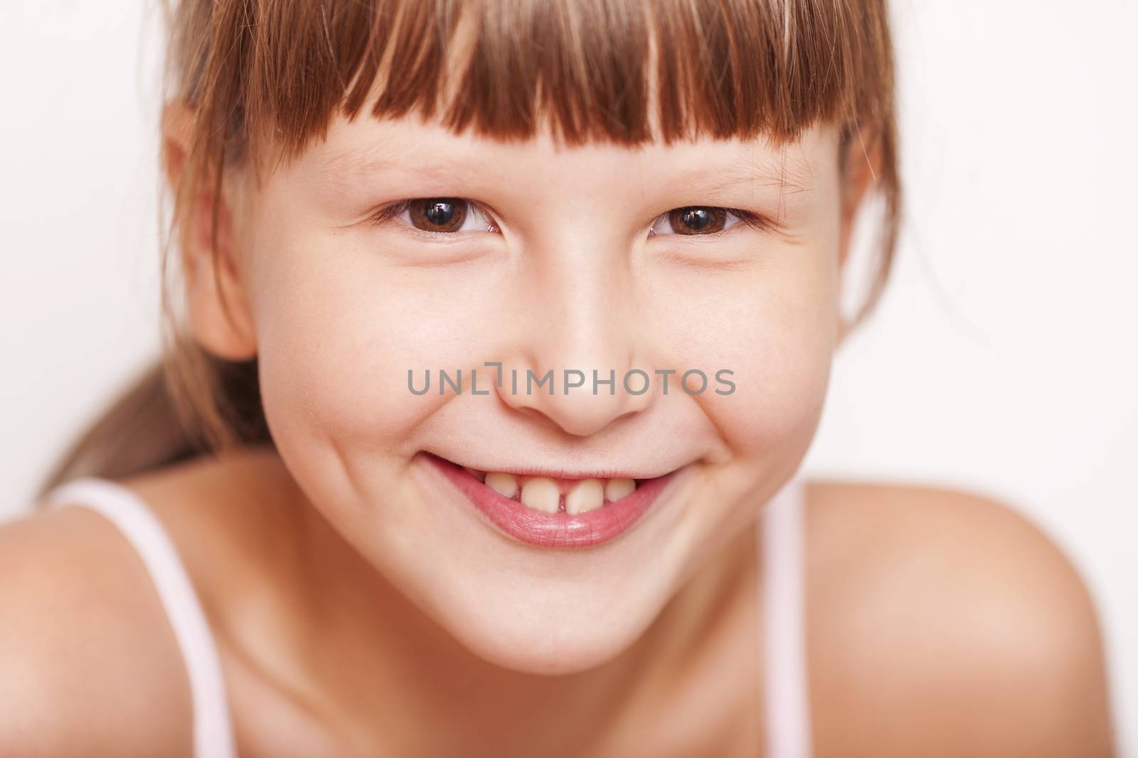 happy smiling girl wearing bangs by olga_sweet