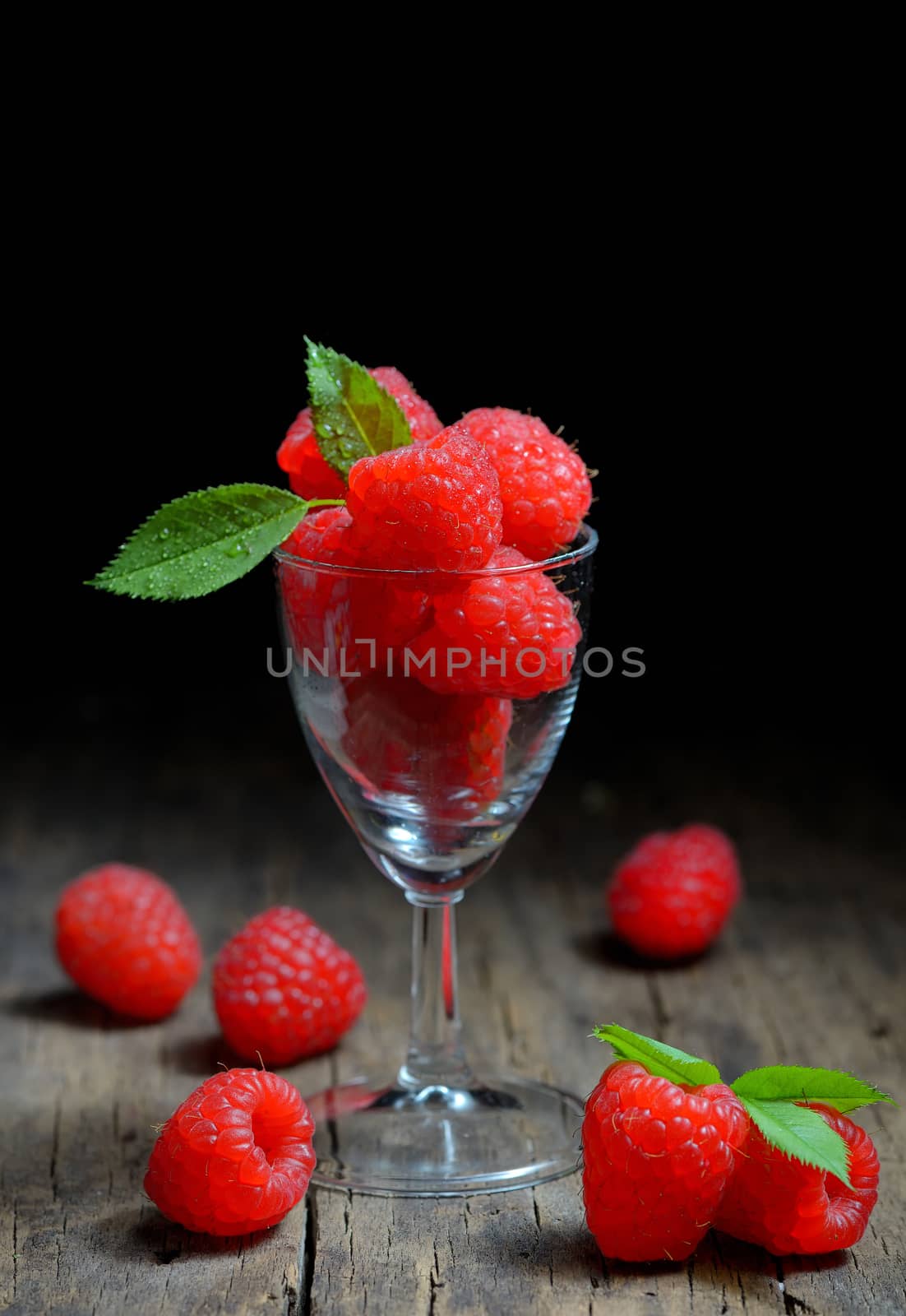 Raspberries in small glass  by mady70