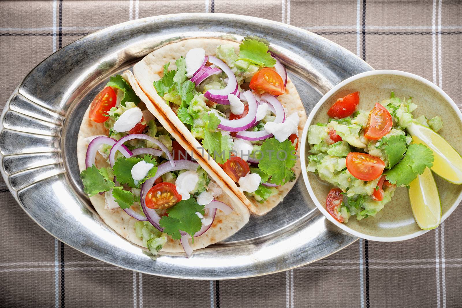 Frish spicy Chicken Tacos on a table. by supercat67