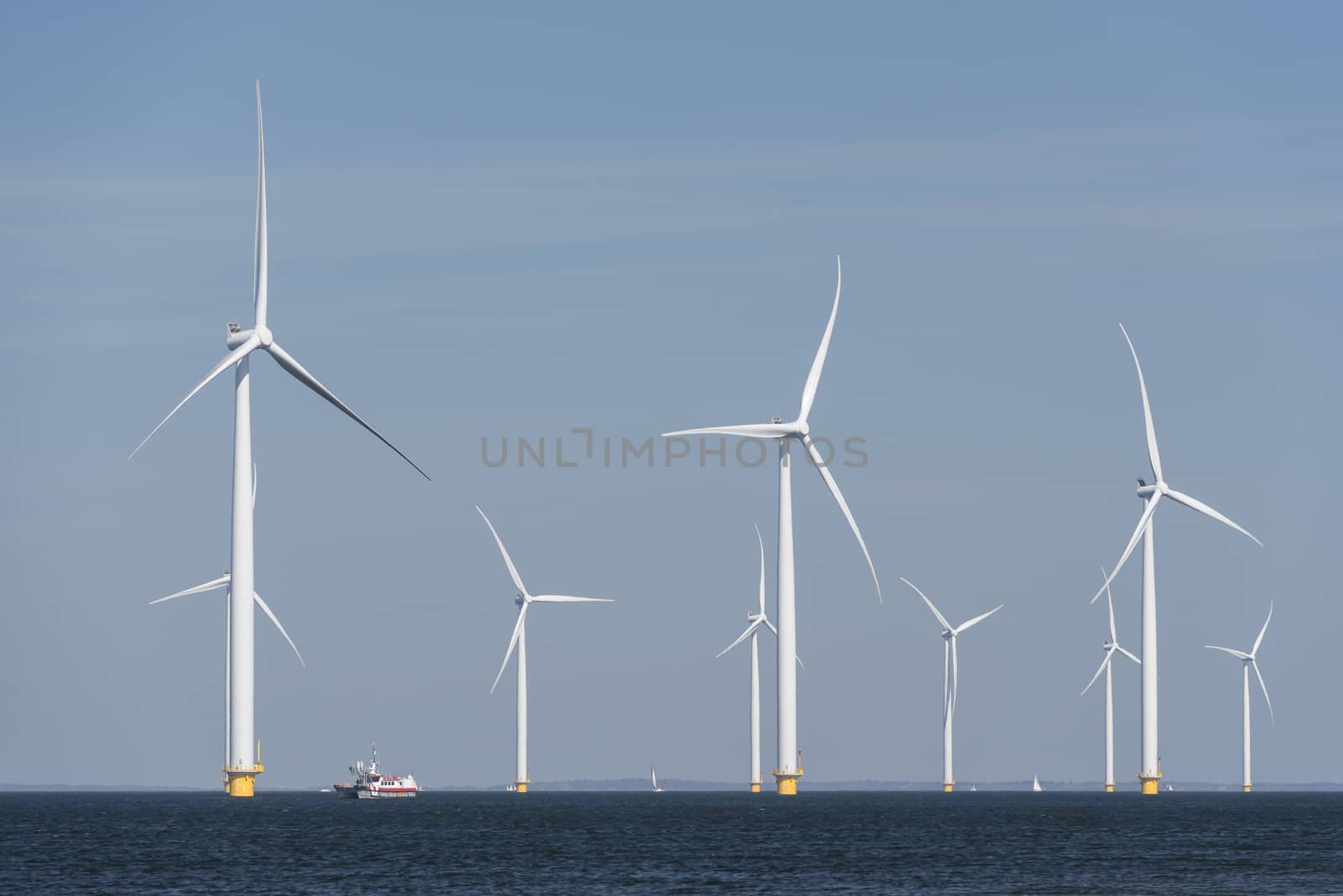 Wind farm in the water off the coast of the noordoostpolder in the Netherlands
