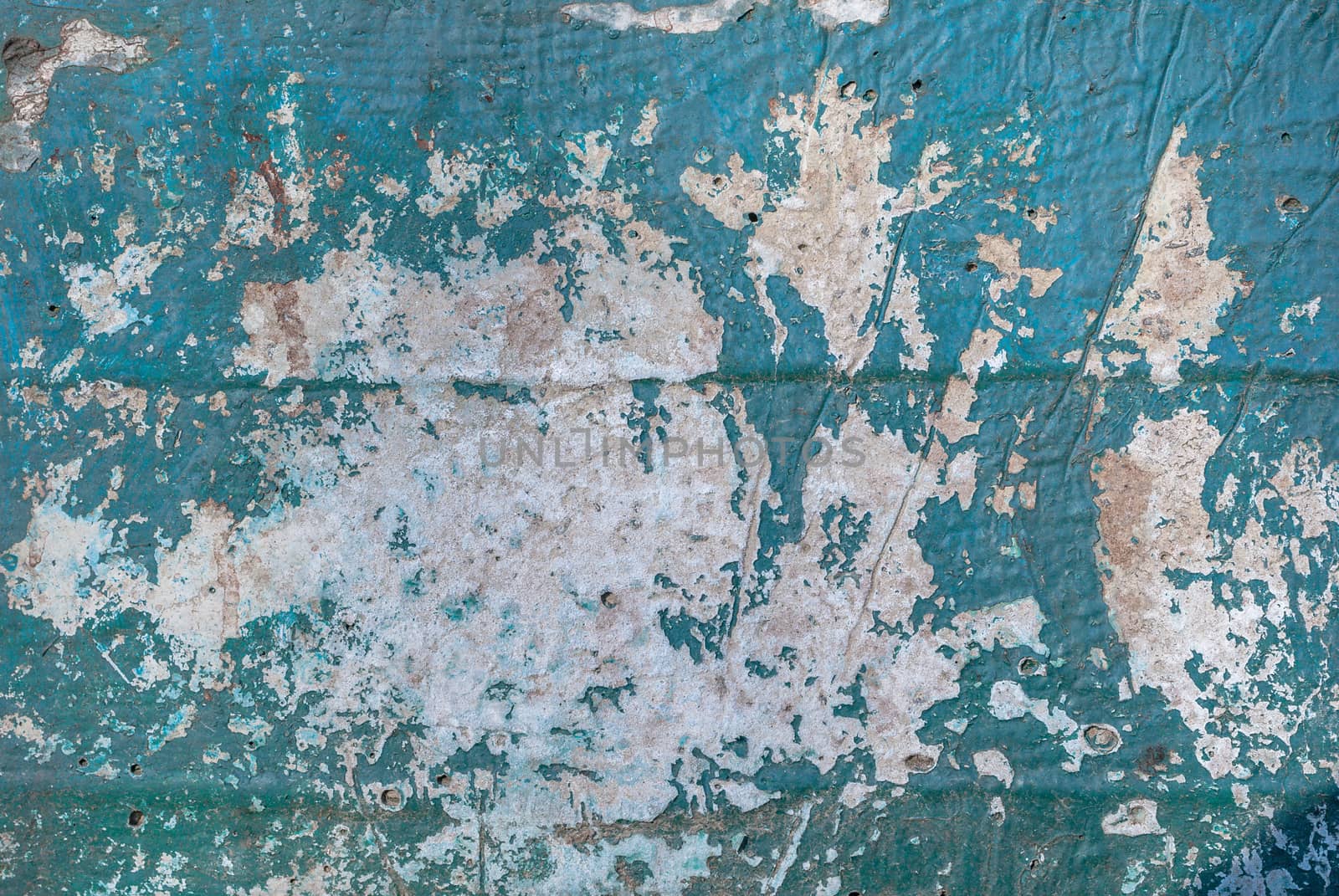 chipped paint on an old plaster wall, texture background by uvisni
