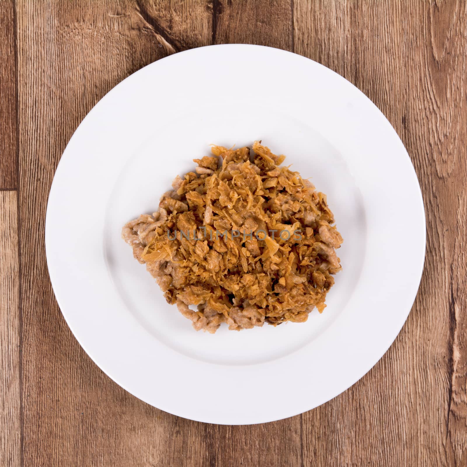 Vegetarian food on a plate with wooden background by neryx