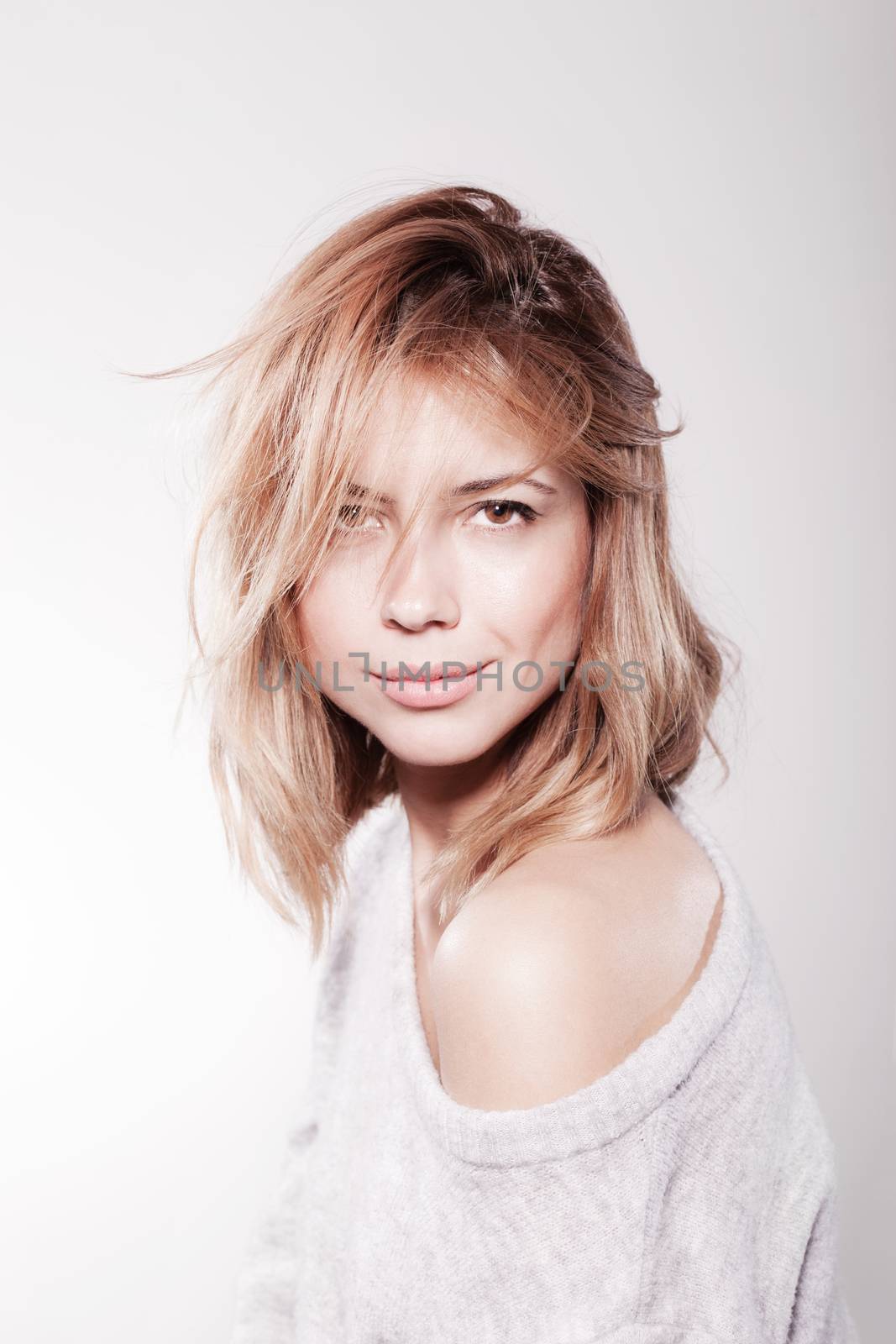 Studio portrait of attractive caucasian girl