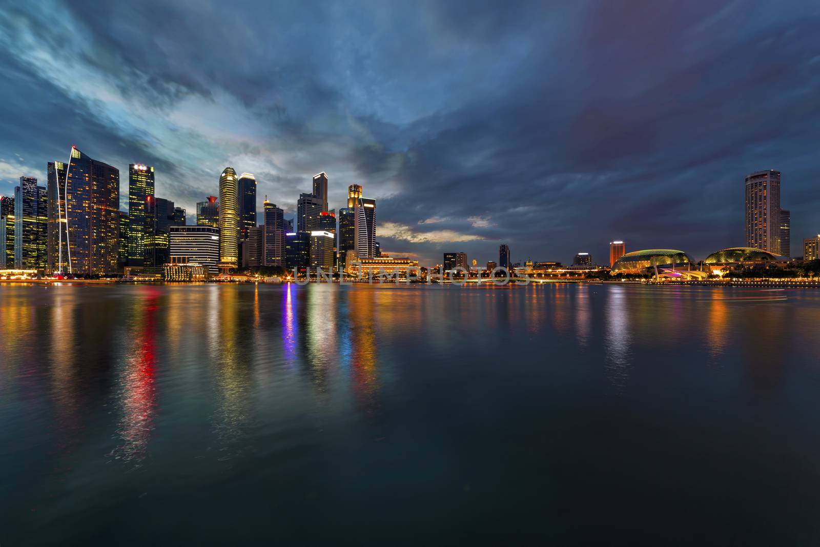 Singapore Central Business District CBD city skyline during evening twilight blue hour from Marina Bay
