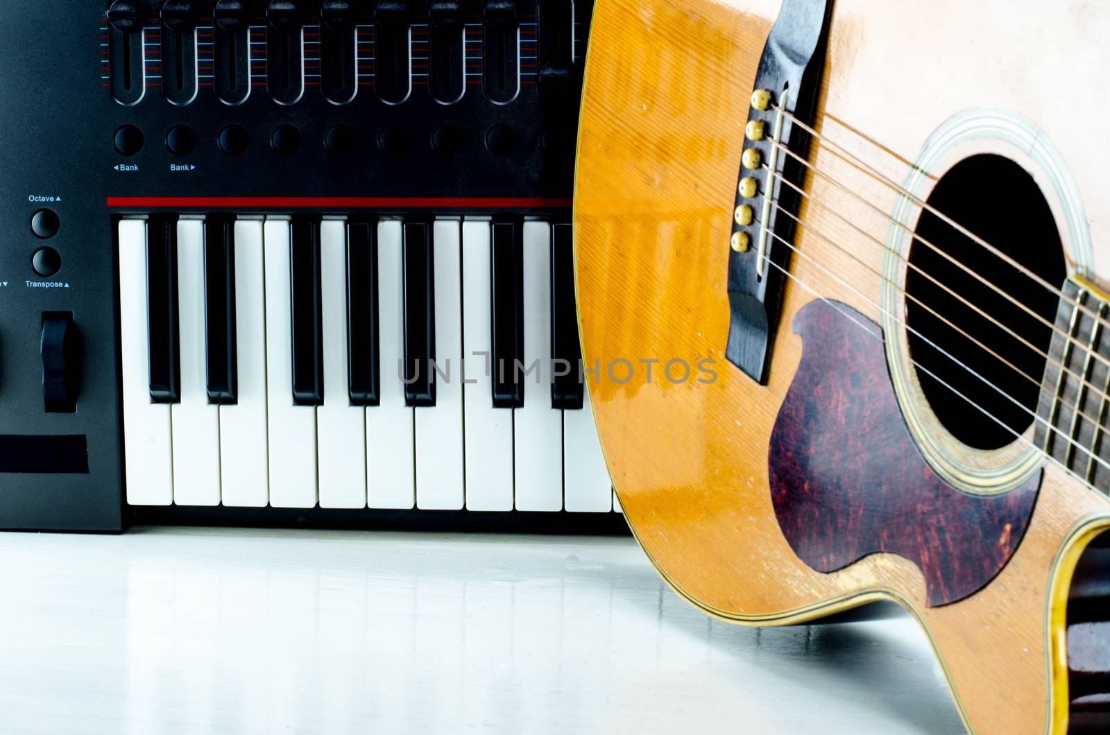 Acoustic guitar keyboard, close-up.