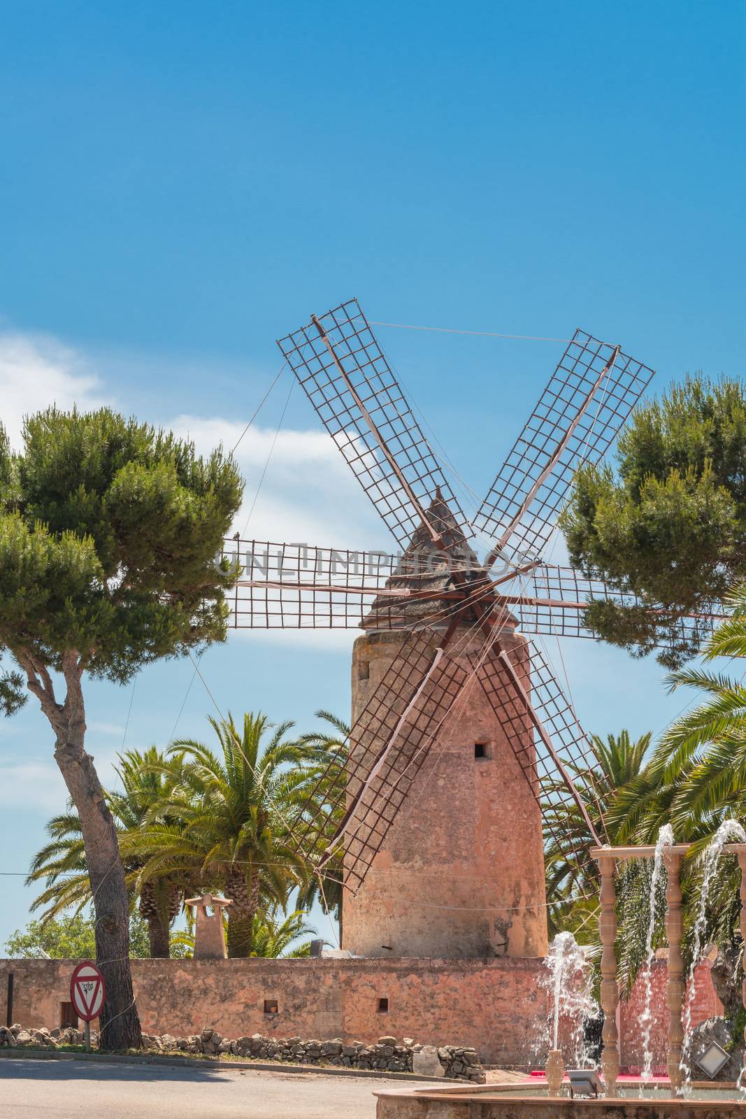 Old historic windmill on a farm of Majorca (Spain)