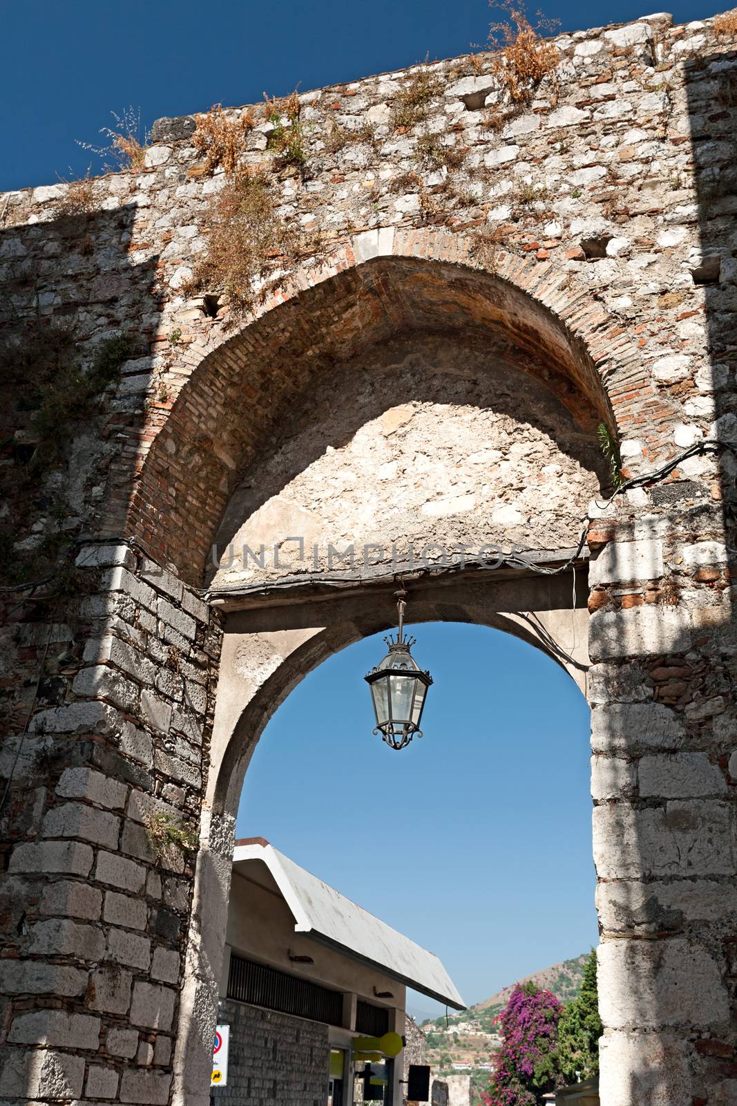 The medieval arch of Porta Catania in Taormina, Sicily, Italy