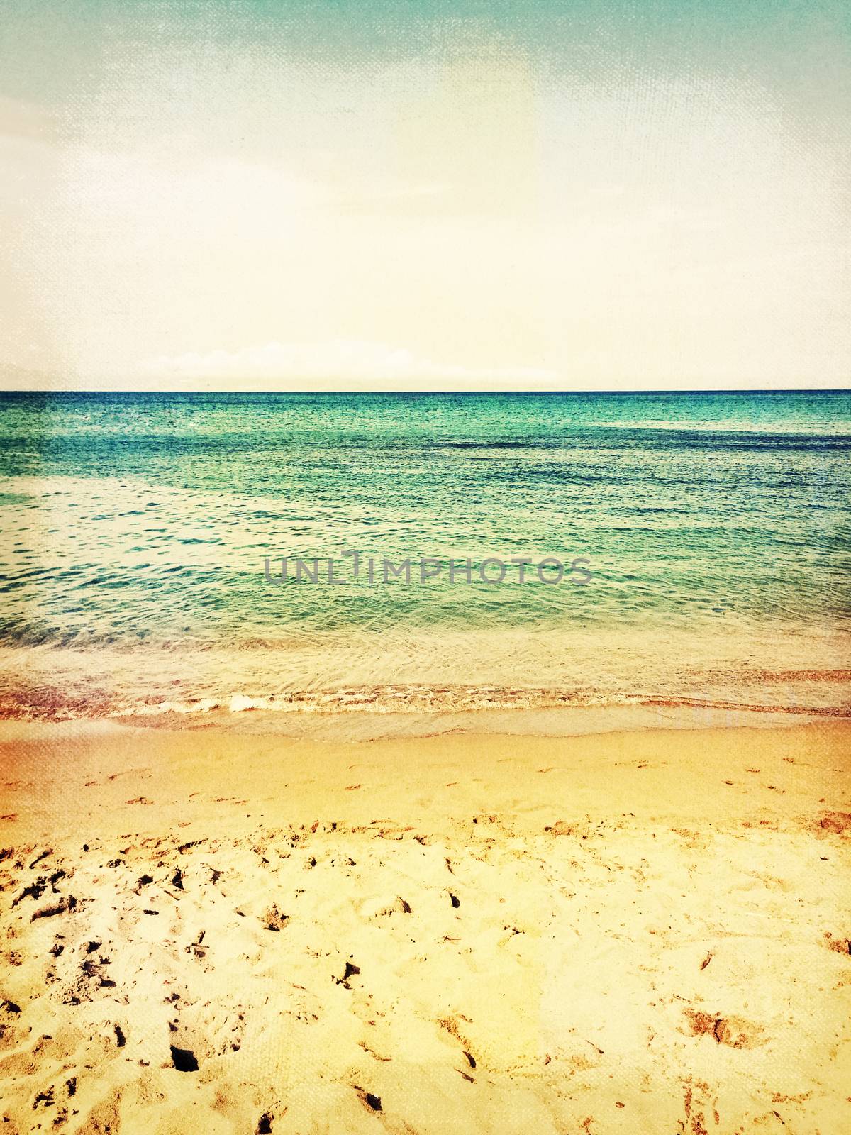 Sea and beach. Vintage style photo with paper texture.