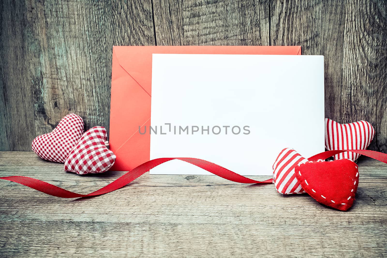 greeting card heart on wooden background