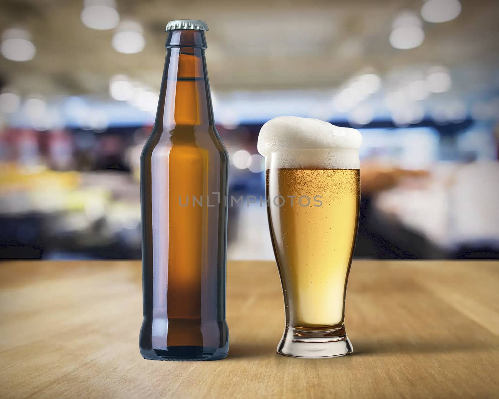 beer bottle and mug of beer on the bar