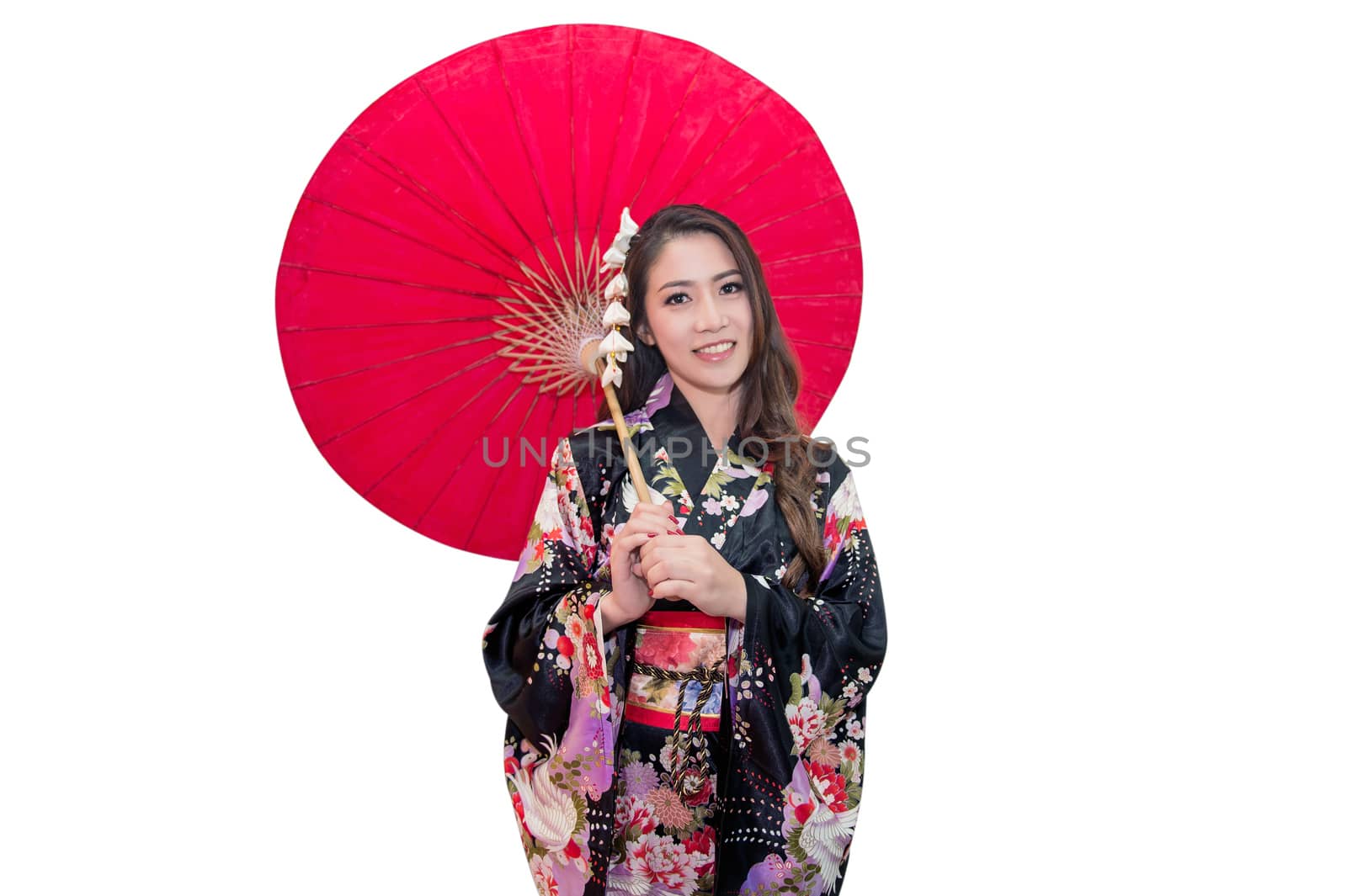Beautiful young asian woman wearing traditional japanese kimono with red umbrella isolated on white background. by gutarphotoghaphy