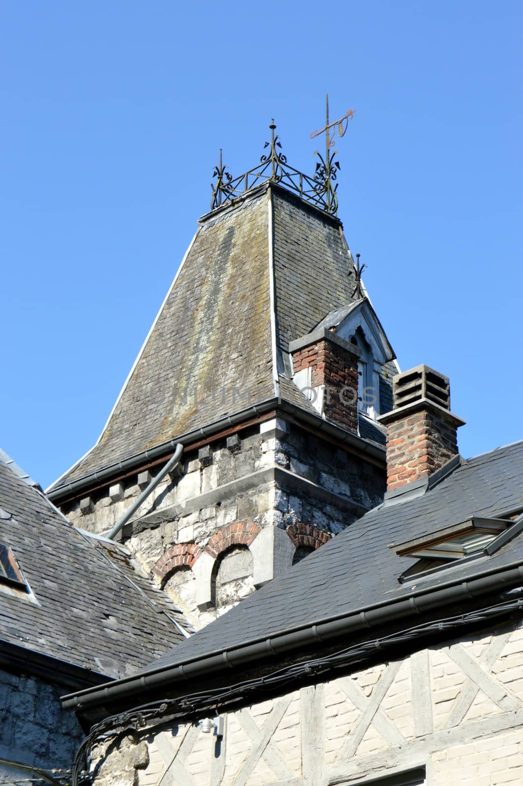 Old roof on a tower of an old woman batice from the Ardennes