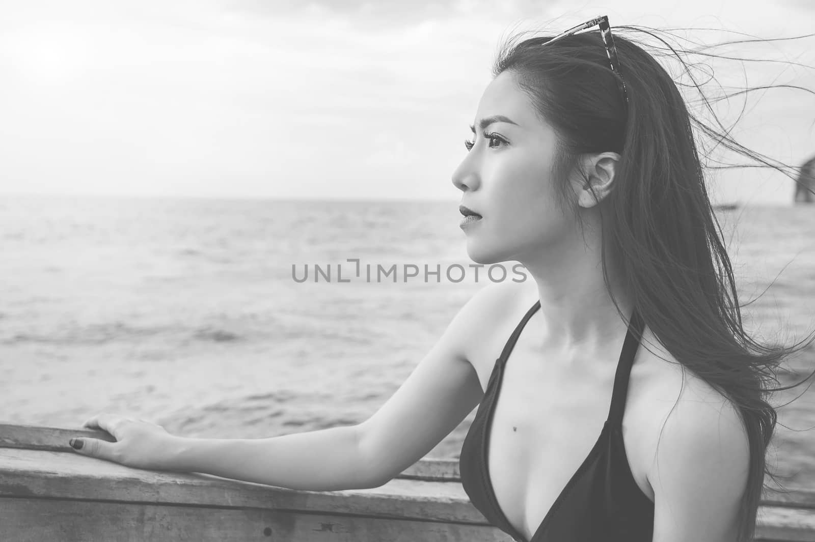 Beautiful girl in bikini. Black and white,(sad)