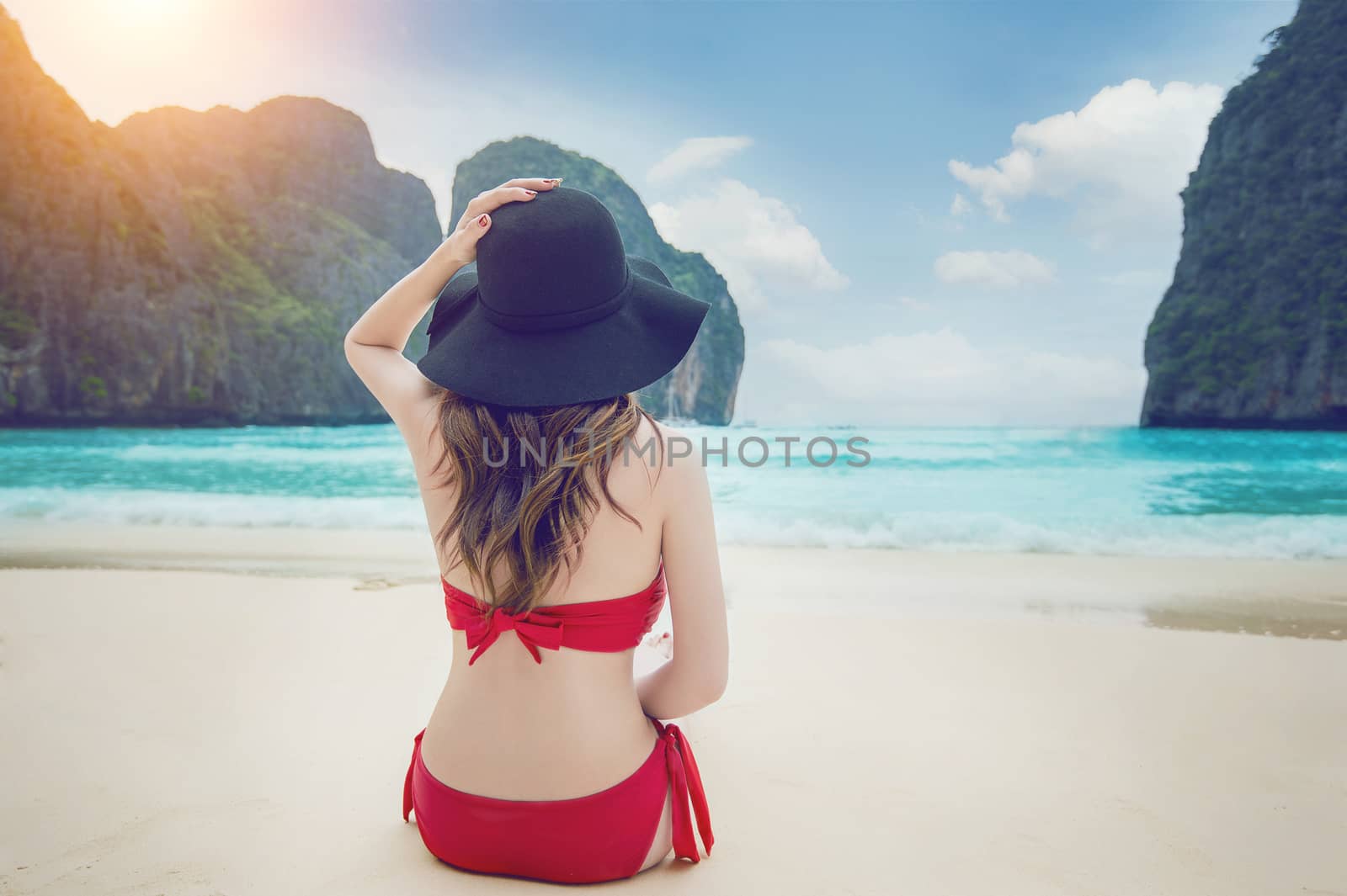 Woman in bikini at beach. Vintage tone. by gutarphotoghaphy