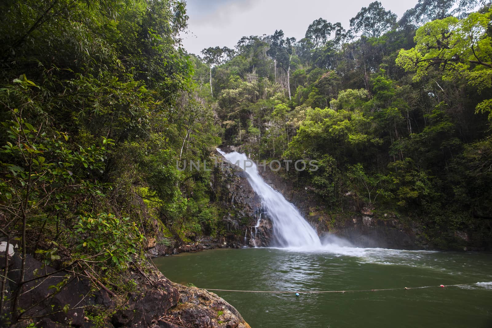Yong Waterfall National Park is one of the attractions of Nakhon SI thammarat province Thailand. Natural background waterfall. waterfall Colorful leaves. waterfall thailand tropical
