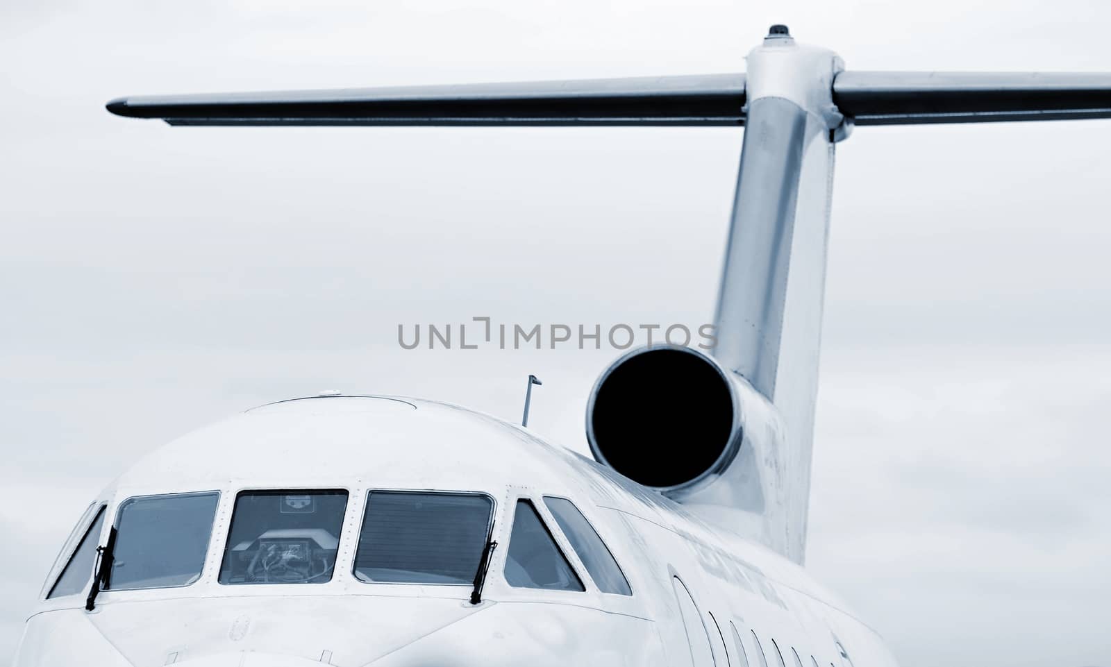 Top of the jet airplane with engine in tail. 