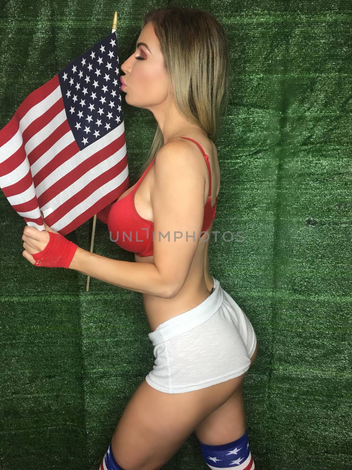 Ana Braga the Brazilian Playmate celebrates Memorial Day with a sexy Patriotic social media shoot, which her pet cat interrupts, Los Angeles, CA 05-24-17/ImageCollect by ImageCollect