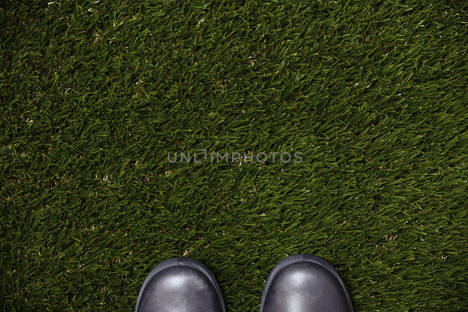 Boots on a grass by Novic